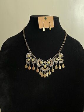 Vintage-style brass-tone statement necklace with filigree flower links